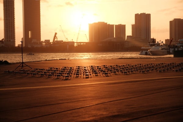 Sunset over a drone light show grid