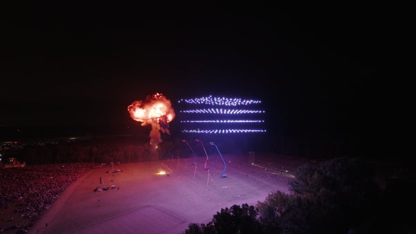 Fireball explosion while drones take off