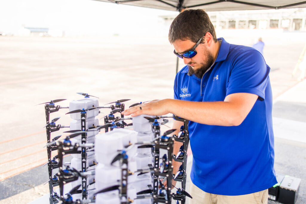 Plugging-in-light-show-drones