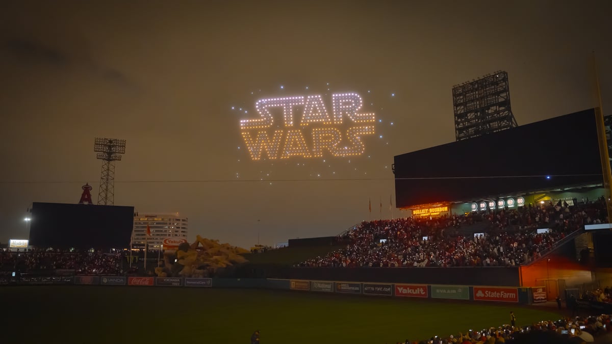 A drone show at Agnel stadium showing the star wars logo