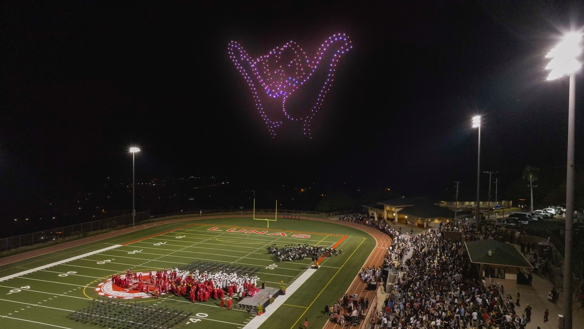 a drone show shows the Shaka hand sign for the Lahaina high school graduation ceremony