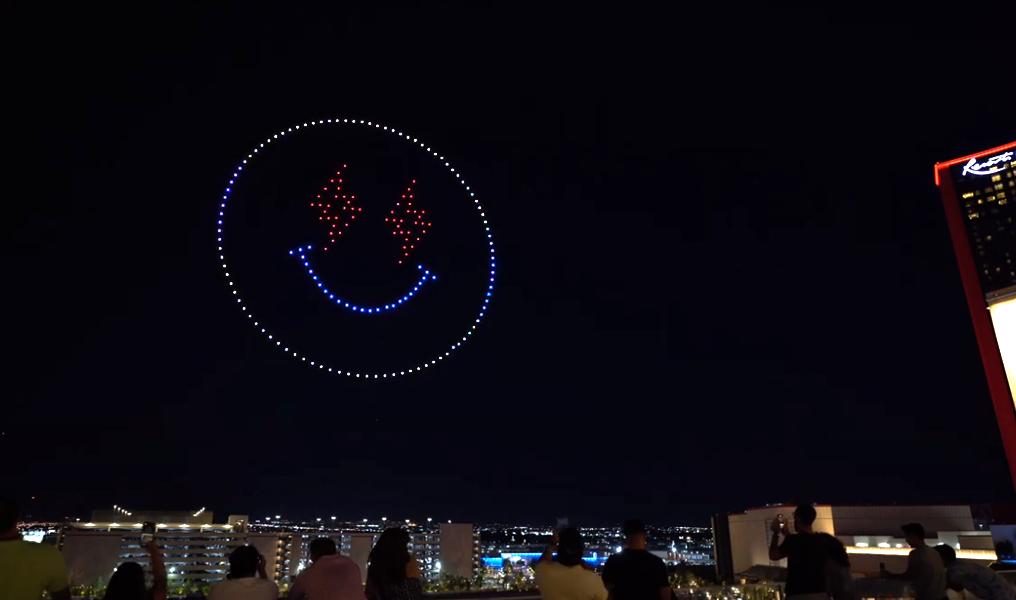 NEON smiley face made with 250 light show drones