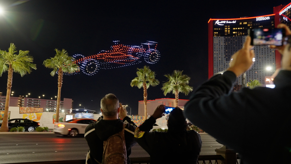 drone light show with F1 racecar