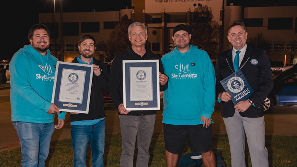 Sky Elements poses with two Guinness World Records